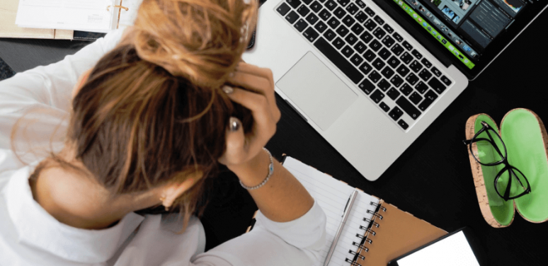 woman at computer frustrated