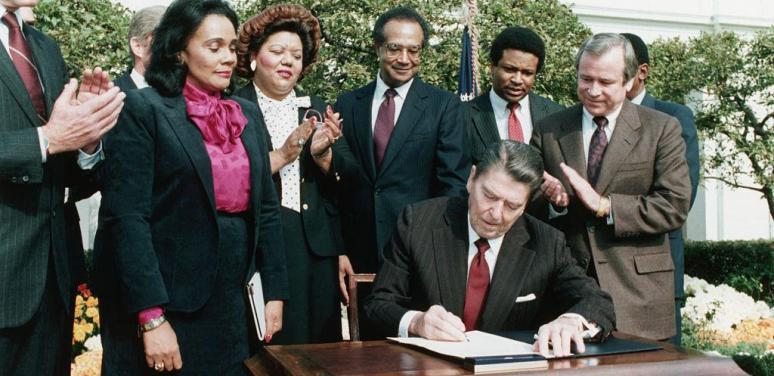 reagan signing law