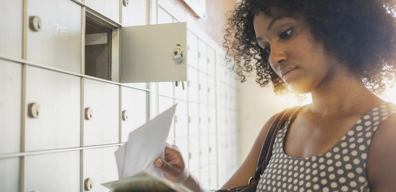 Woman getting mail.